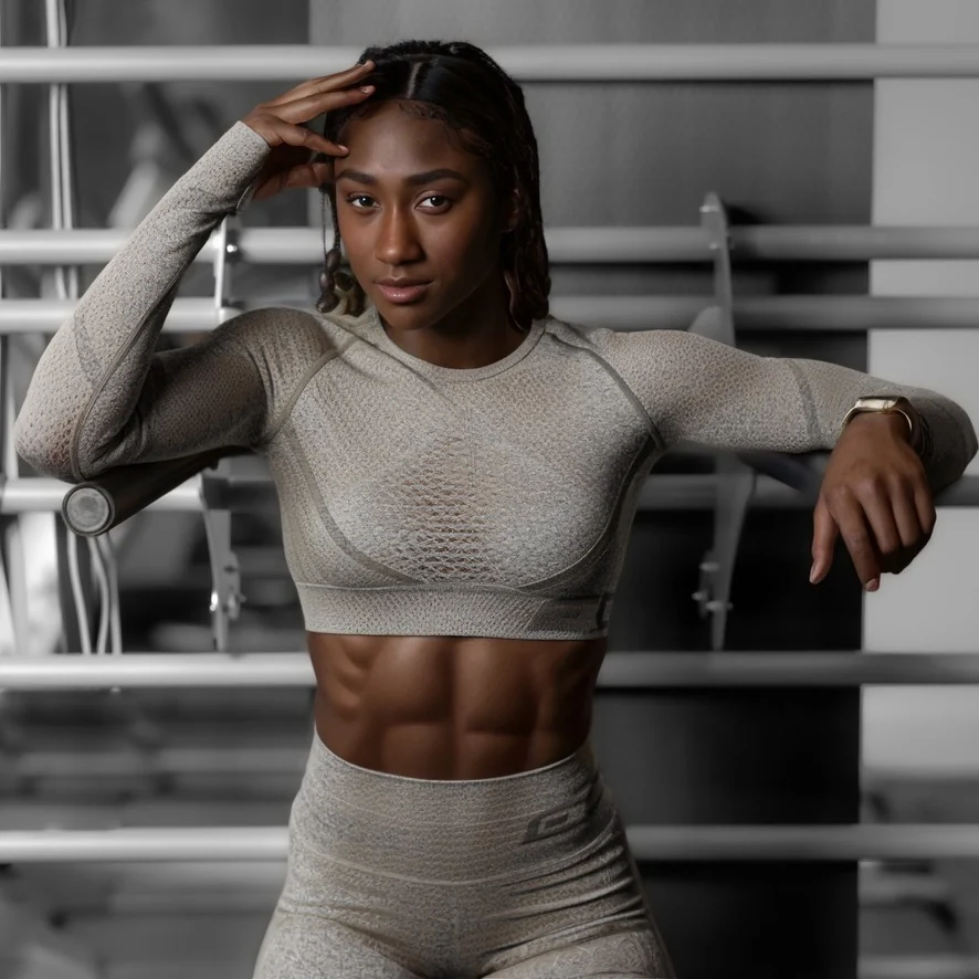 Seated athlete in gray activewear